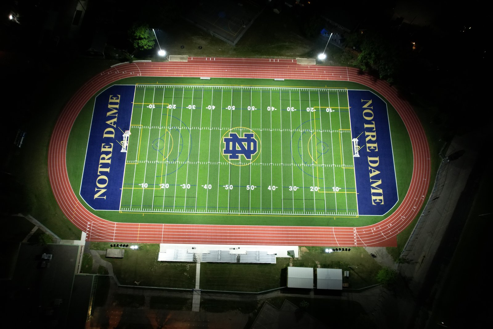 Notre Dame football field and track at night 7